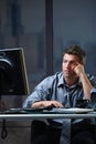 Tired professional looking at screen troubled Royalty Free Stock Photo