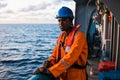 Seaman AB or Bosun on deck of vessel or ship , wearing PPE Royalty Free Stock Photo