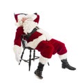 Tired Santa Claus Sitting On Chair