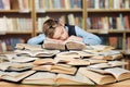 Tired School Child Sleeping on Books, Bored Boy Studying, Hard Education Royalty Free Stock Photo