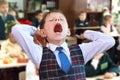 Tired schoolboy. Royalty Free Stock Photo
