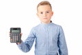 Tired Schoolboy holding calculator. Portrait of funny cute 10s boy .White background Royalty Free Stock Photo