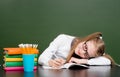 Tired schoolgirl spoils the eyesight during the exam Royalty Free Stock Photo