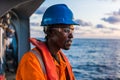 Seaman AB or Bosun on deck of vessel or ship , wearing PPE