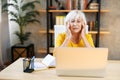 Tired senior business woman is using laptop Royalty Free Stock Photo