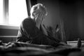 Tired senior woman on her bed Royalty Free Stock Photo