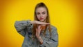 Tired serious teen girl showing time out gesture, limit or stop sign, no pressure, i need more time Royalty Free Stock Photo