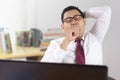 Tired Sleepy Asian Businessman Having Overworked Royalty Free Stock Photo