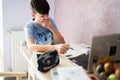 Tired and sleepy student yawns. Young teenage boy having video conference call with pupil using webcam. Online education and e-