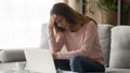 Tired stressed unhappy woman suffering from headache at home Royalty Free Stock Photo