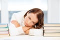 Tired student with books and notes Royalty Free Stock Photo