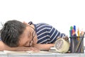 Tired student boy with glasses sleeping on the books Royalty Free Stock Photo