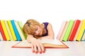 Tired of studies, young Woman is sleeping on her desk with books Royalty Free Stock Photo