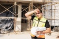 Tired Sweating Construction Worker On Building Site Under Sunlight Royalty Free Stock Photo