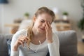 Tired teen girl rubbing eyes feeling eyestrain taking off glasses Royalty Free Stock Photo