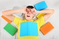 Tired Teenager with a Books Royalty Free Stock Photo