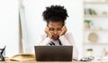 Tired Teenager Girl Sleeping Sitting At Laptop Indoors Royalty Free Stock Photo