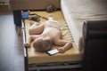 Tired toddler sleep with gadget