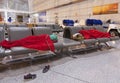 Tired travelers sleeping on the airpot departure gates bench