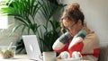 Tired upset middle age woman massaging hurt stiff neck isolated on desk at office, fatigued sad midage lady rubbing tensed muscles