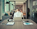 Tired western businessman with a lot of work in office