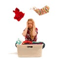 Tired woman with a basket of loundry annoyed with too much work Royalty Free Stock Photo