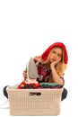 Tired woman with a basket of loundry annoyed with too much work Royalty Free Stock Photo