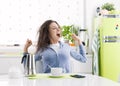 Tired woman having breakfast at home Royalty Free Stock Photo