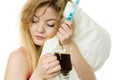 Tired woman holding toothbrush and coffee