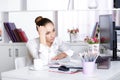 Tired woman manager in the office Royalty Free Stock Photo