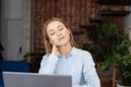 Tired woman massaging rubbing stiff on sore neck Royalty Free Stock Photo