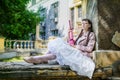 Tired woman with a pink rifle resting Royalty Free Stock Photo