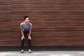 Tired woman runner breathing, taking run break Royalty Free Stock Photo