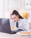 Tired woman working on laptop at home Royalty Free Stock Photo