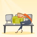 Tired woman sleeping on suitcase at the airport. Royalty Free Stock Photo