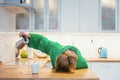 Tired woman sleeping on the table in the kitchen at breakfast. Royalty Free Stock Photo