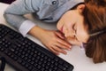 Tired woman sleeping at work Royalty Free Stock Photo