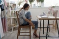 Tired woman worker massage feet suffer from uncomfortable shoes Royalty Free Stock Photo