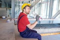 Tired worker on building site is having a break Royalty Free Stock Photo