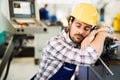 Tired worker fall asleep during working hours in factory Royalty Free Stock Photo