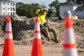 Tired worker. Worker man on the building construction. Construction site worker in helmet work outdoors. Builder worker Royalty Free Stock Photo