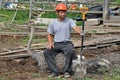 Tired Worker sits on ostrich