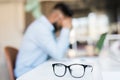 Tired and worried indian business man at workplace over laptop in office Royalty Free Stock Photo