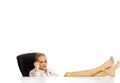 Tired young business woman holding legs on the desk Royalty Free Stock Photo