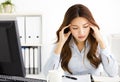 tired young business woman working in office Royalty Free Stock Photo