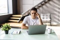 Tired young man feel pain eyestrain holding glasses rubbing dry irritated eyes fatigued from computer work, stressed man suffer Royalty Free Stock Photo