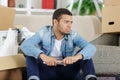 tired young man resting on floor Royalty Free Stock Photo