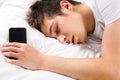 Young Man sleep with a Phone Royalty Free Stock Photo
