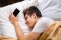 Young Man sleep with a Phone Royalty Free Stock Photo