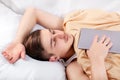 Young Man sleep with a Tablet Royalty Free Stock Photo